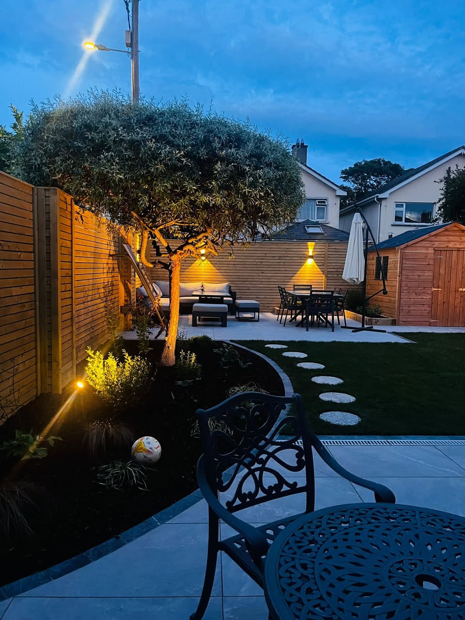 Landscaped garden with outdoor lighting