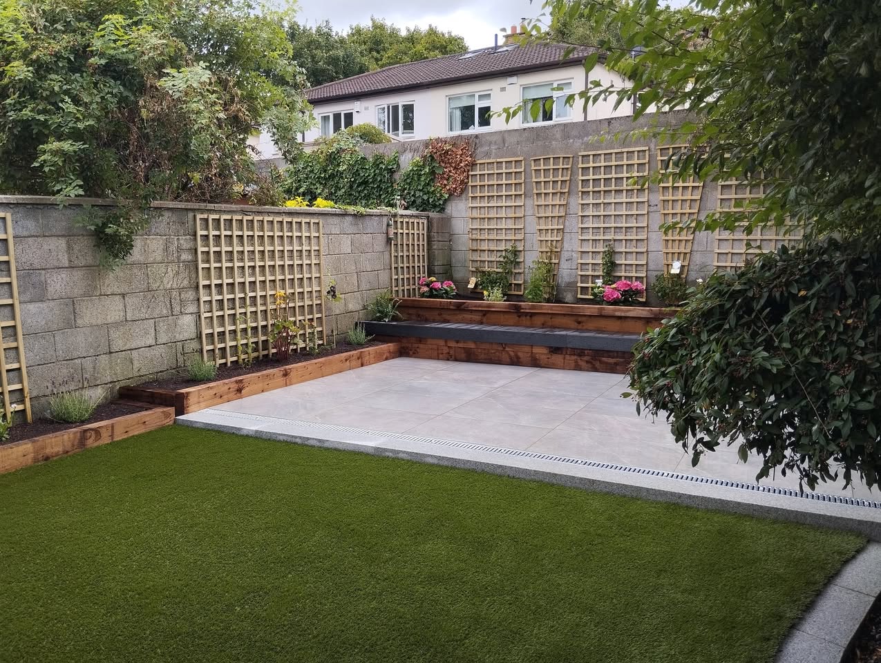 Raised timber beds and block wall trellises