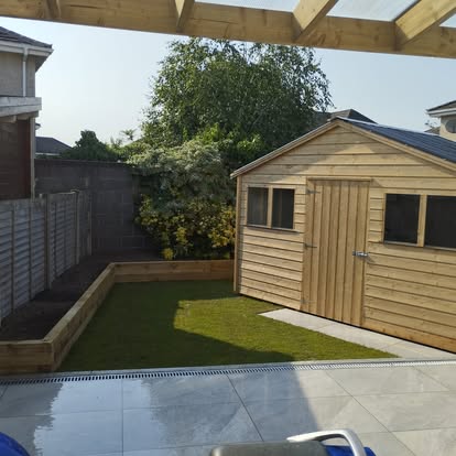 Garden shed, lawn and raised planters