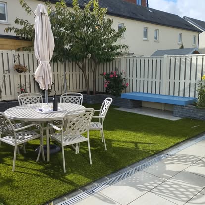 Artificial grass and stone planters
