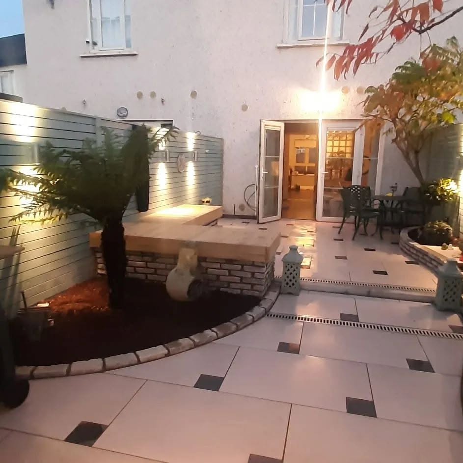 Patio with built-in bench and garden lighting
